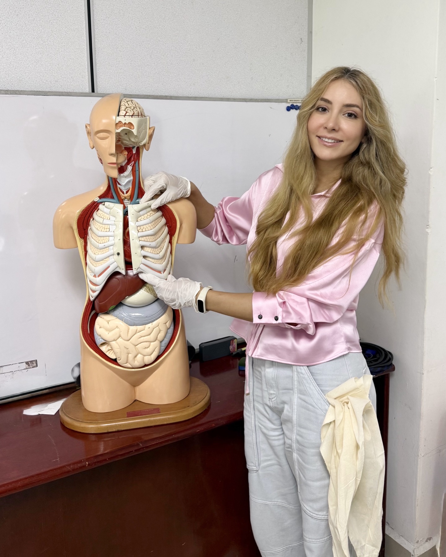 Tina Ka explaining health and anatomy
