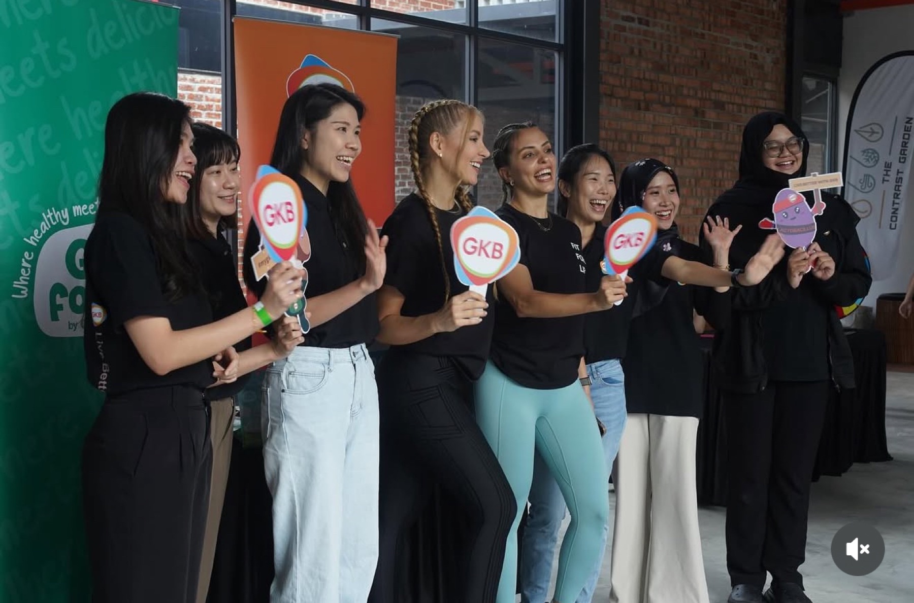 Tina Ka with a smiling community wellness team